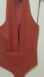 Orange body suit with chocker